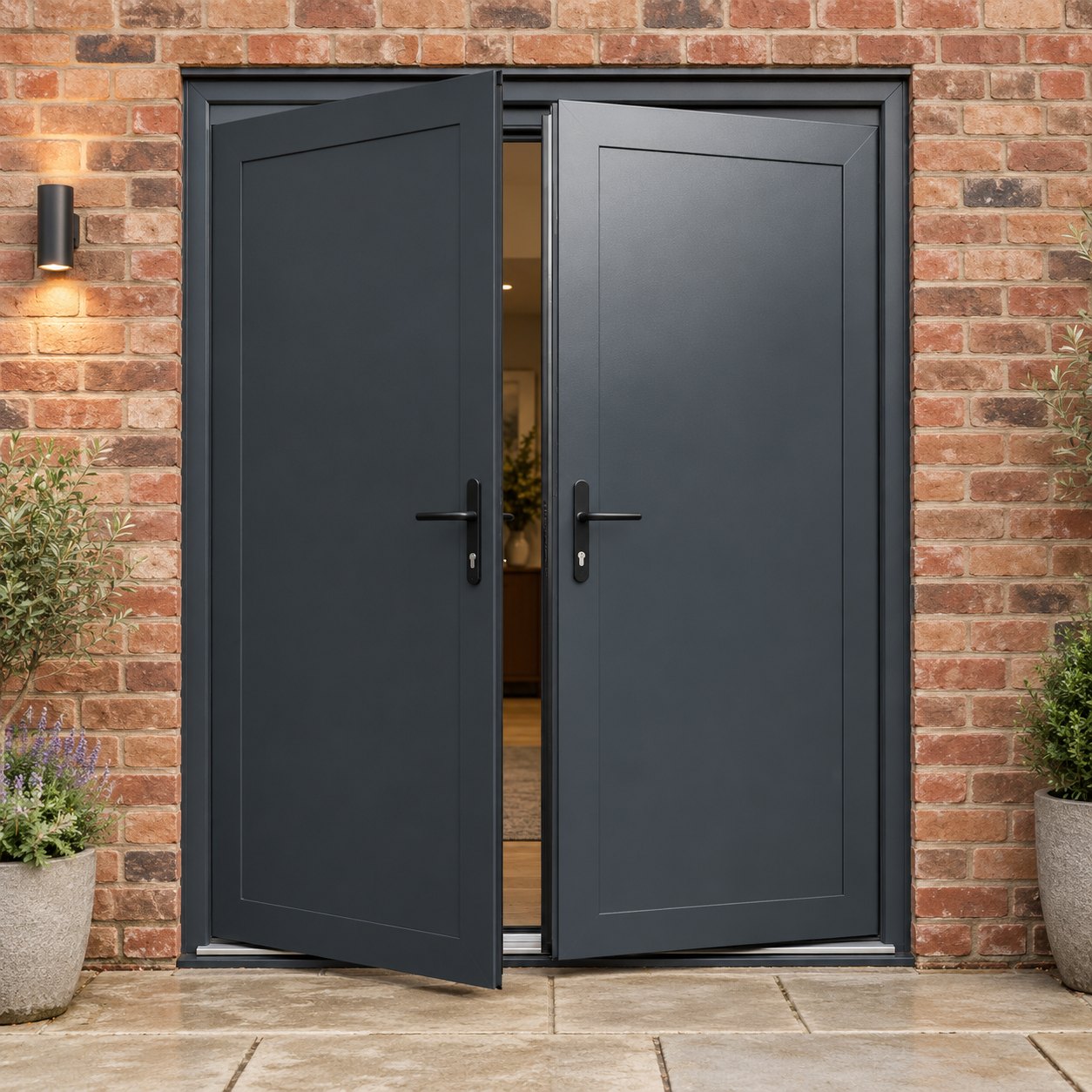 Aluminium French Door with Full Steel Panels opening onto a brick patio