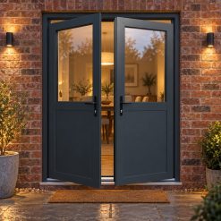 Aluminium French Door with Half Panels lit up in the evening