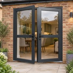 Aluminium French Door with Midrails opening onto a brick patio