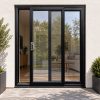 Black uPVC 2 pane sliding patio door fitted to the back of a house