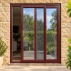 Rosewood uPVC 2 pane sliding patio door fitted to the back of a house