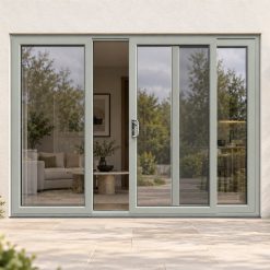 Agate Grey uPVC 3 pane sliding patio door on a house in daylight