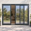 Anthracite Grey uPVC 3 pane sliding patio door fitted to the back of a house