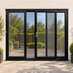 Black uPVC 3 pane sliding patio door fitted to the back of a house