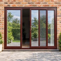 Rosewood uPVC 3 pane sliding patio door fitted to the back of a house