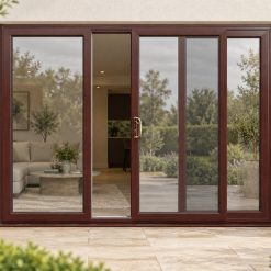 Rosewood uPVC 3 pane sliding patio door on a house in daylight