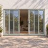 Agate Grey uPVC 4 pane sliding patio door fitted to the back of a house