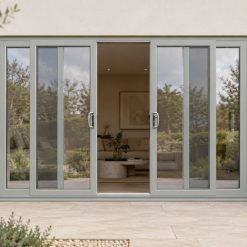 Agate Grey uPVC 4 pane sliding patio door on a house in daylight