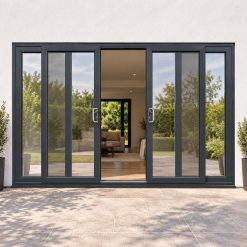 Anthracite Grey uPVC 4 pane sliding patio door fitted to the back of a house
