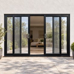 Black uPVC 4 pane sliding patio door fitted to the back of a house