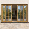Irish Oak uPVC 4 pane sliding patio door fitted to the back of a house