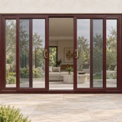 Rosewood uPVC 4 pane sliding patio door on a house in daylight