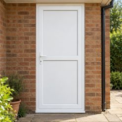 Full Flat Panel uPVC Single Door with Midrail by a garden path