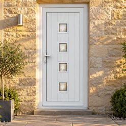 Full Panel uPVC Single Door – Hayes 4 Glazed on a stone house