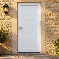 Full Panel uPVC Single Door – Lyndon Solid on a stone house