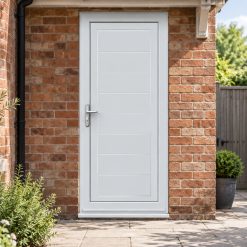 Full Panel uPVC Single Door – Lyndon Solid by a garden path