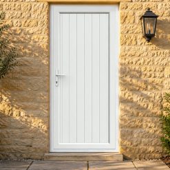 Full Panel uPVC Single Door – Tongue & Groove Panel on a stone house