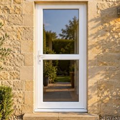Fully Glazed uPVC Single Door with Midrail on a stone house