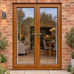 Golden Oak uPVC French Doors fitted to the back of a house