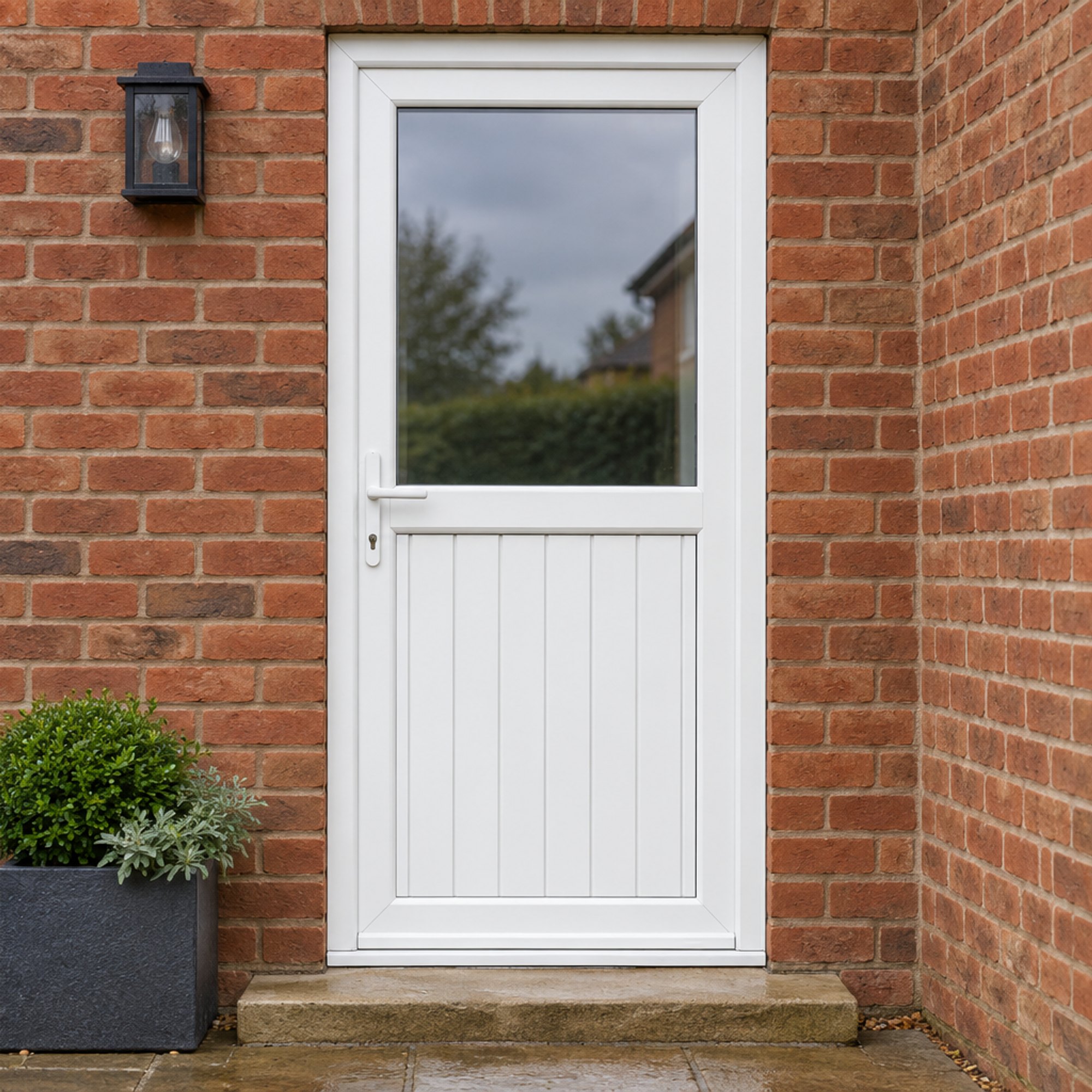 Half Glazed uPVC Single Door – Tongue & Groove Panel fitted to a house