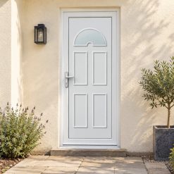 uPVC Single Door – Carter One on a rendered house