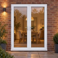 White uPVC French Doors lit up in the evening