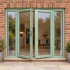 Chartwell Green French Doors with Side Panels fitted to the back of a house