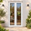1190mm x 2090mm - White uPVC French Doors fitted to the back of a house