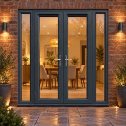 1790mm x 2090mm - Grey-on-White French Doors with Narrow Side Panels lit up in the evening