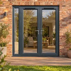 1790mm x 2090mm - Grey-on-White uPVC French Doors with Narrow Side Panel opening onto garden decking