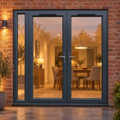 2090mm x 2090mm - Grey-on-White uPVC French Doors with Narrow Side Panel lit up in the evening