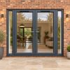 2390mm x 2090mm - Grey-on-White uPVC French Doors with Narrow Side Panels fitted to the back of a house